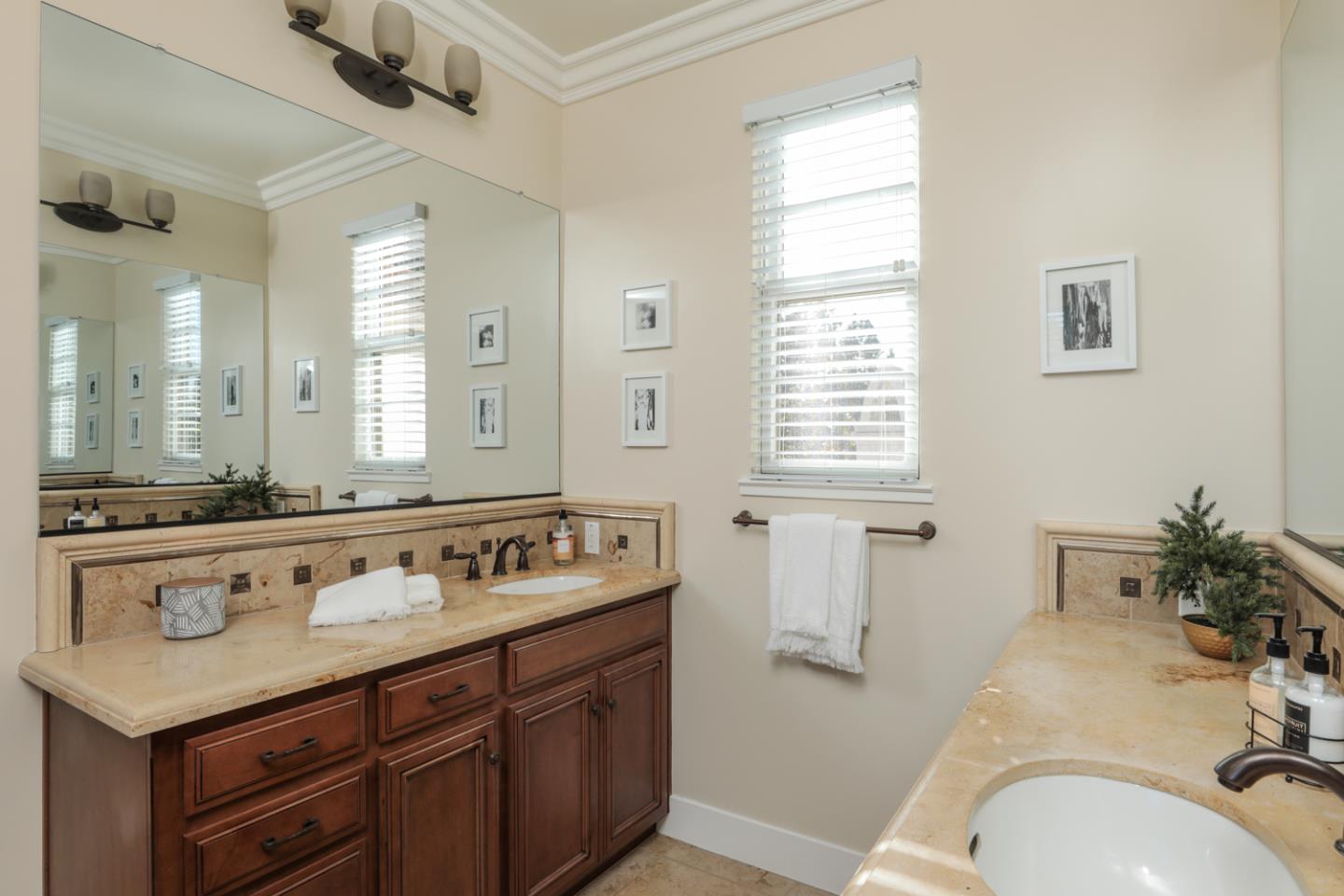 920 Rincon Street Mountain View, CA 94040 - Photo 24 of 45 a bathroom with a granite countertop sink and a mirror