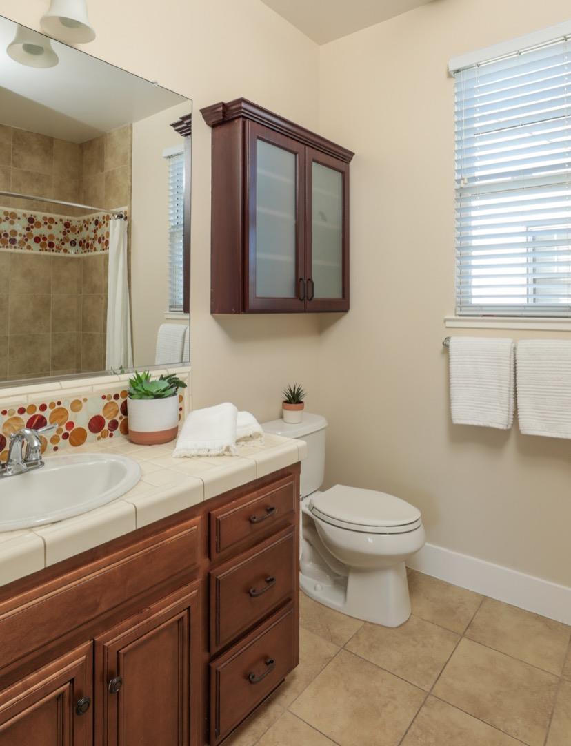 920 Rincon Street Mountain View, CA 94040 - Photo 31 of 45 a bathroom with a sink a toilet and mirror