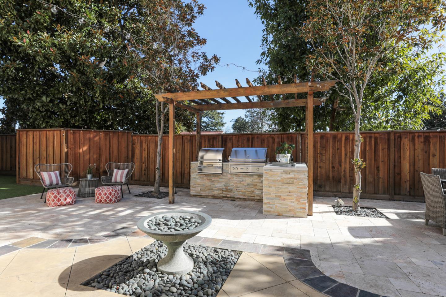 920 Rincon Street Mountain View, CA 94040 - Photo 33 of 45 a view of backyard with outdoor seating and trees