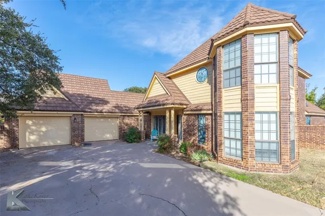 a front view of house with yard