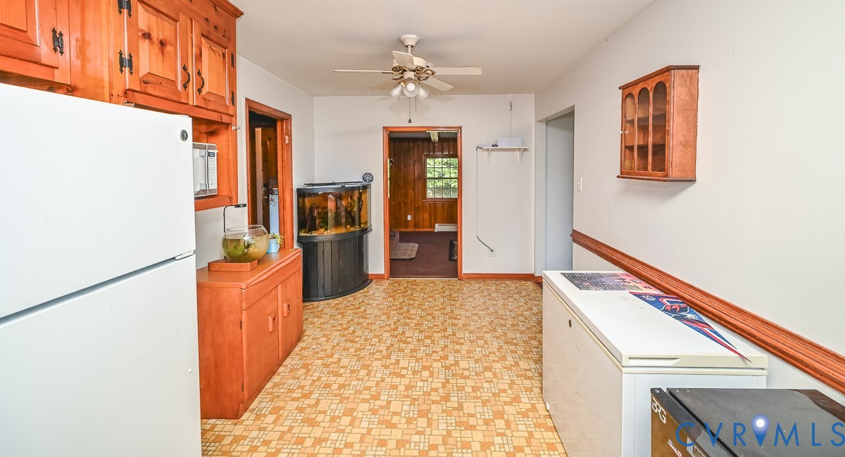 8968 King William Road Aylett, VA 23009 - Photo 5 of 17 Kitchen featuring freestanding refrigerator, a cei