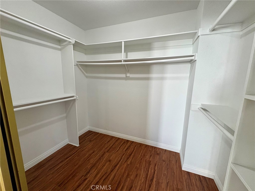 7280 Comiso Way Rancho Cucamonga, CA 91701 - Photo 39 of 66 a view of an empty walk in closet
