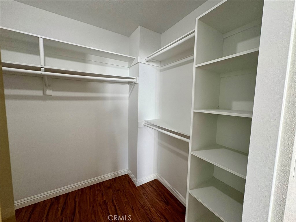 7280 Comiso Way Rancho Cucamonga, CA 91701 - Photo 40 of 66 a view of walk in closet with empty racks