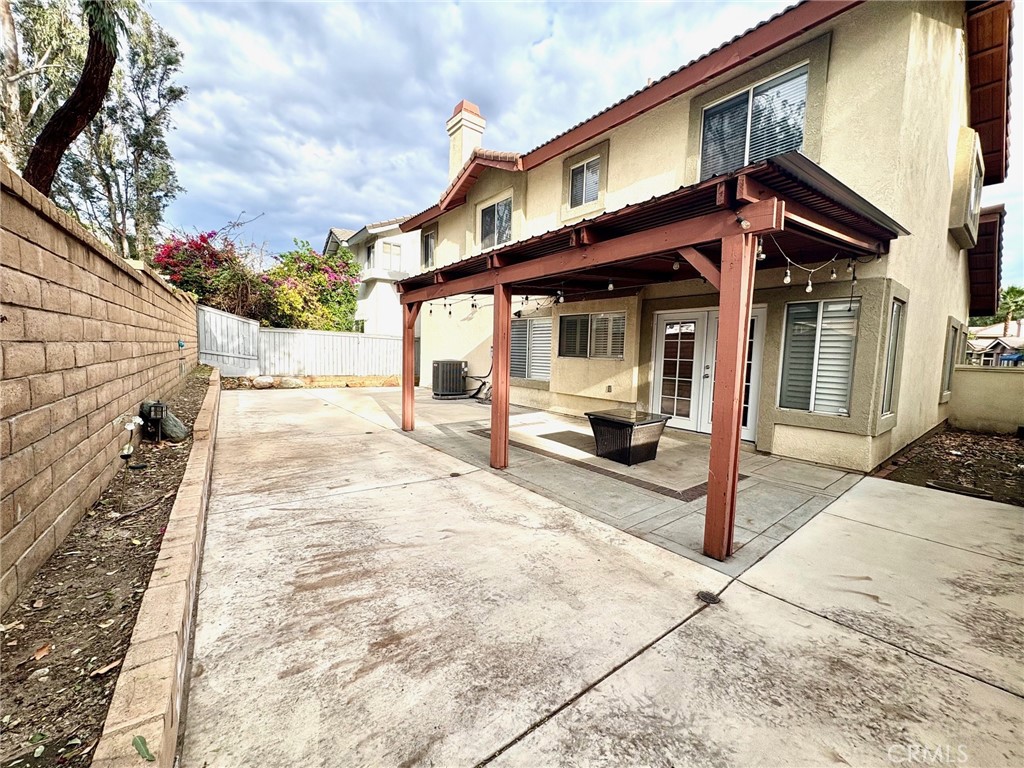 7280 Comiso Way Rancho Cucamonga, CA 91701 - Photo 62 of 66 a view of a house with a wooden fence