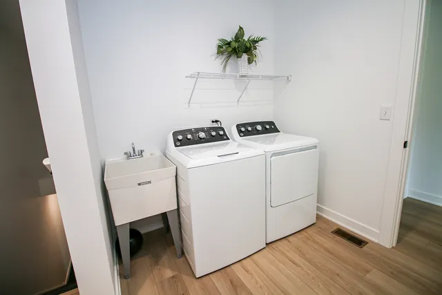 a utility room with dryer and washer