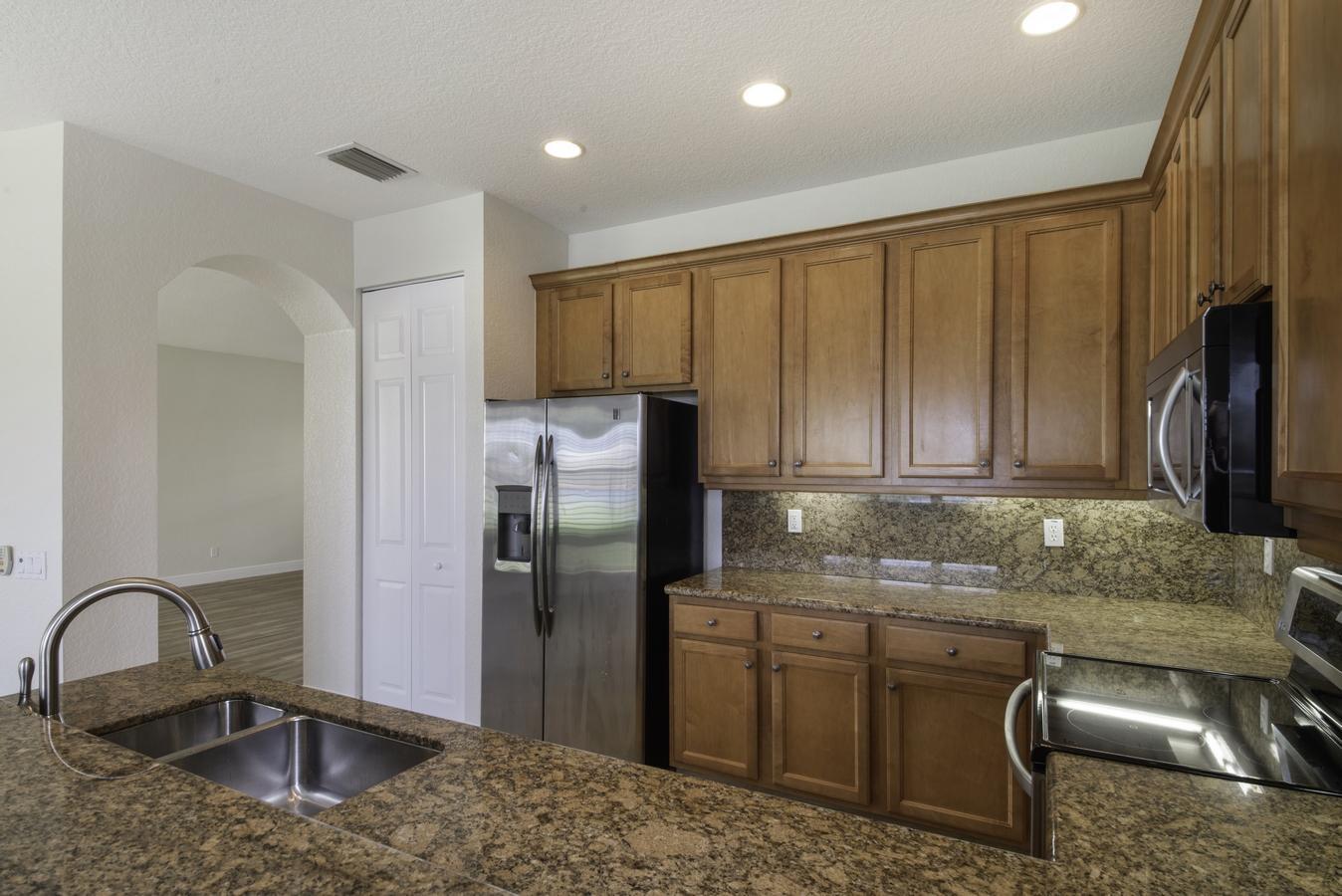 8895 Chestnut Ridge Way Boynton Beach, FL 33473 - Photo 8 of 49 High Hat Lighting