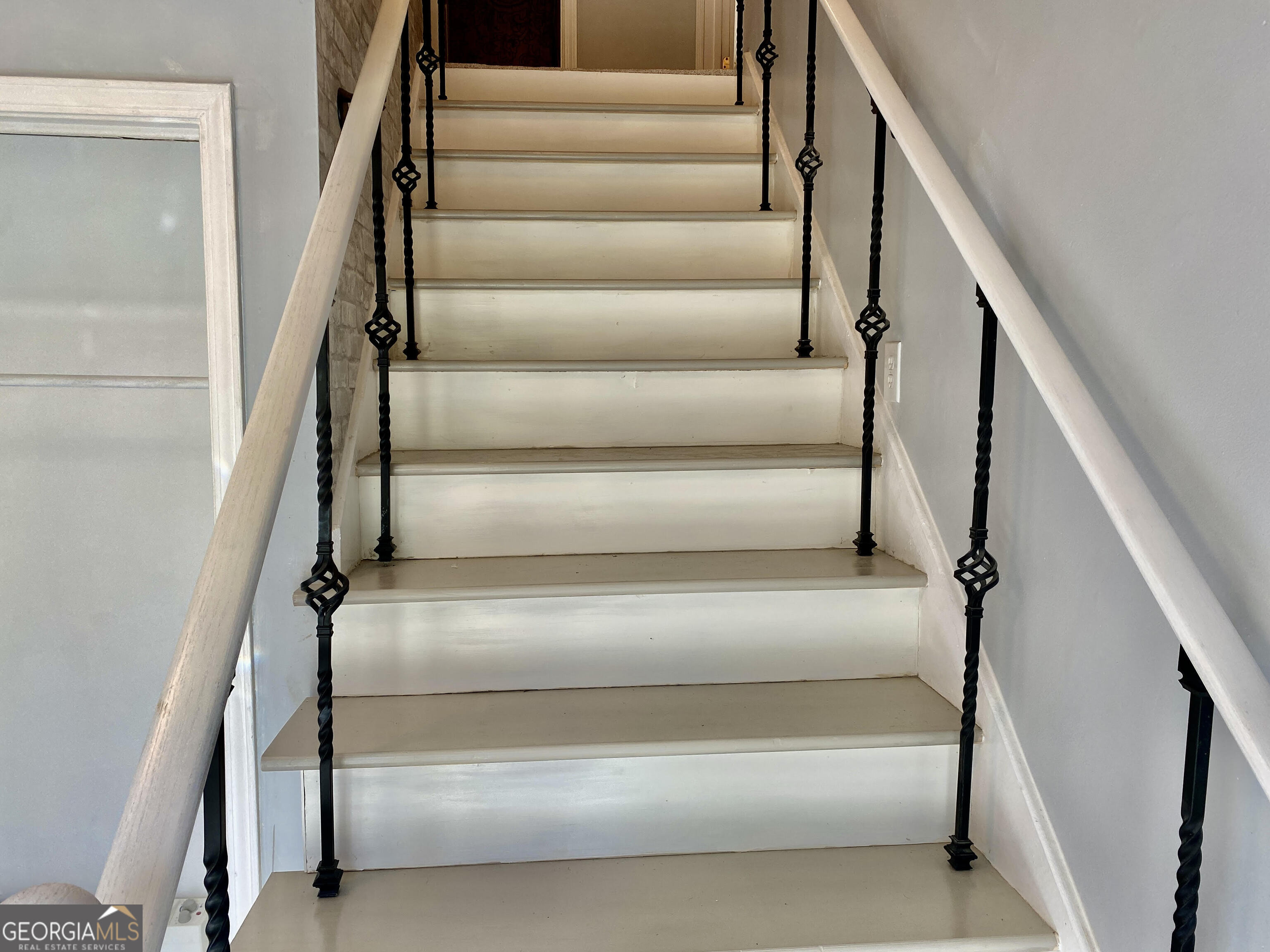 5 Red Fox Drive Southwest Rome, GA 30165 - Photo 14 of 22 a view of staircase with lots of frames on wall