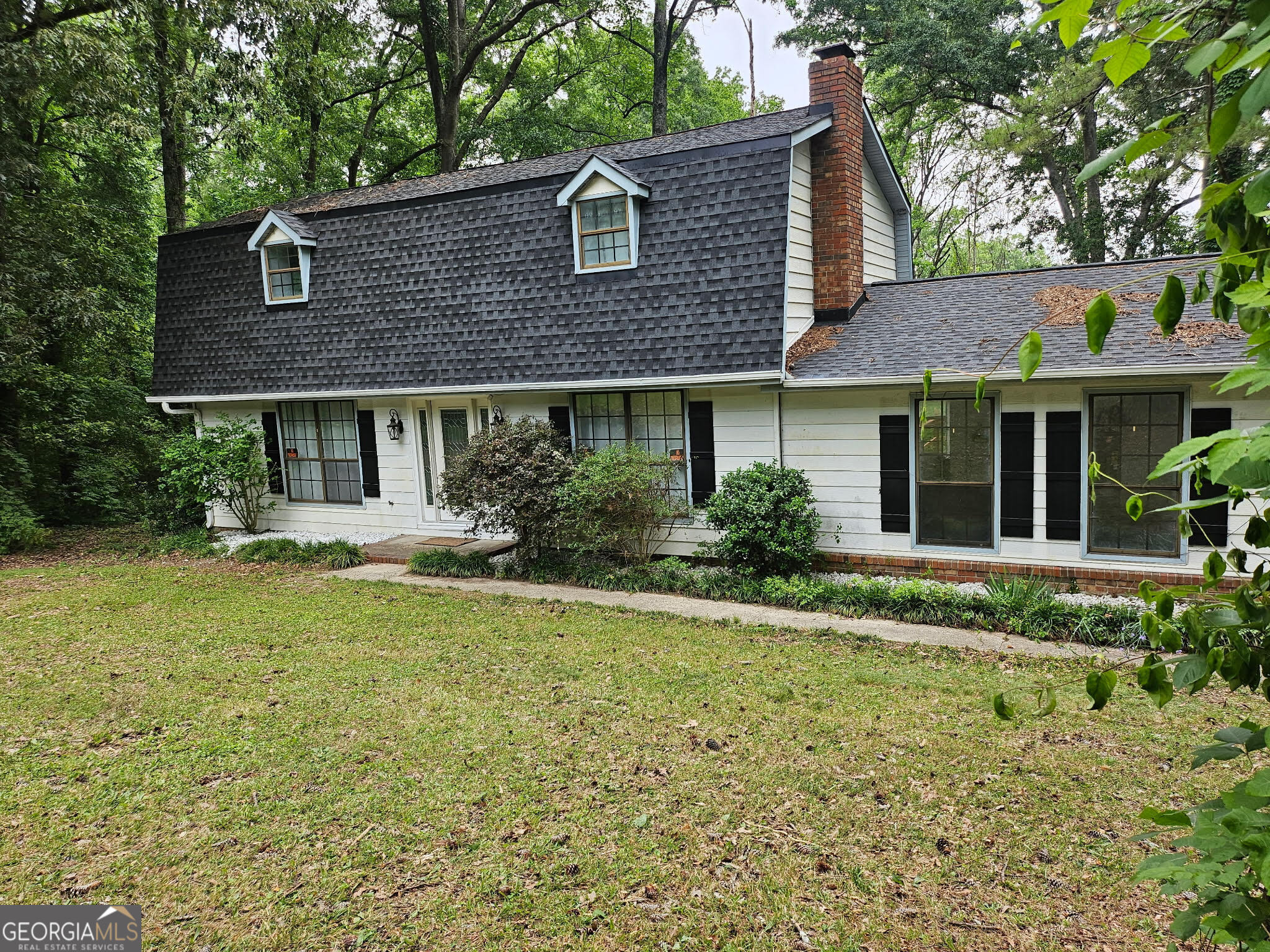 5 Red Fox Drive Southwest Rome, GA 30165 - Photo 2 of 22 a house that has a lot of plants in it