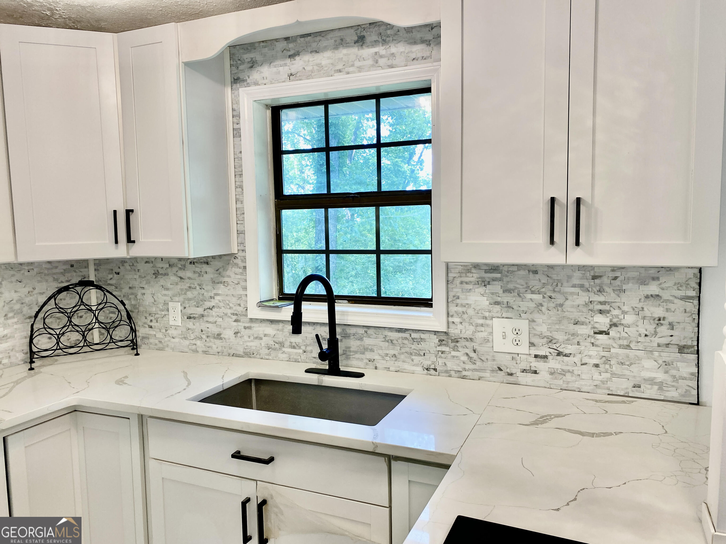 5 Red Fox Drive Southwest Rome, GA 30165 - Photo 7 of 22 a kitchen with a sink and cabinets