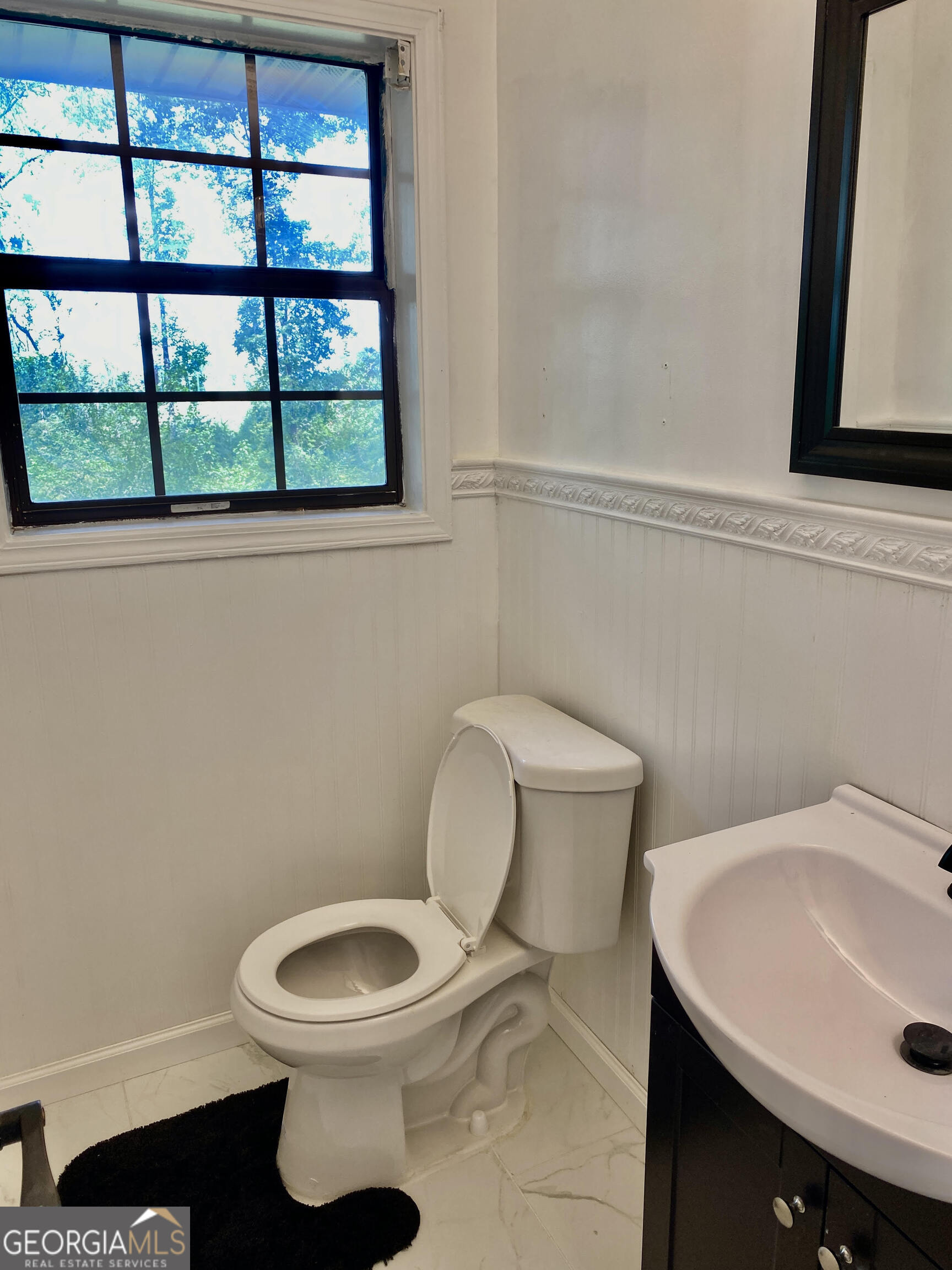 5 Red Fox Drive Southwest Rome, GA 30165 - Photo 10 of 22 a bathroom with a toilet sink and mirror