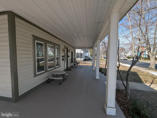 a view of a porch with furniture