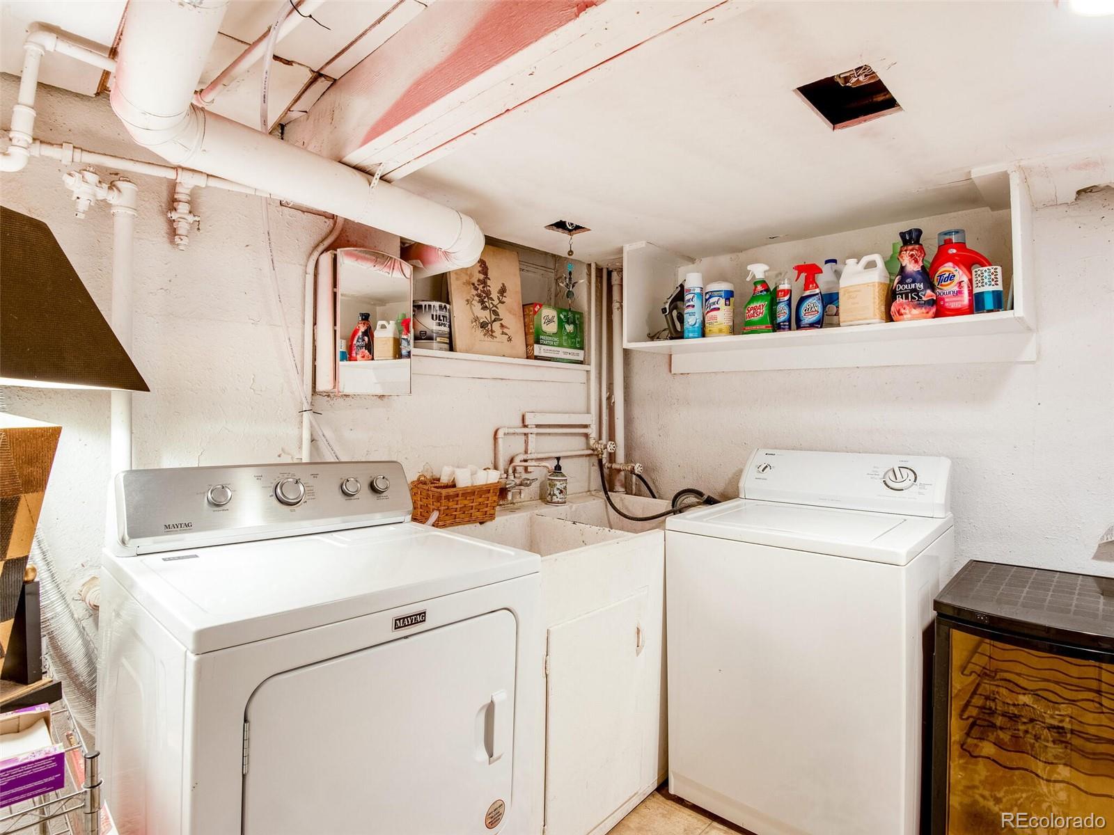 520 East 5th Avenue Denver, CO 80203 - Photo 25 of 40 a utility room with dryer and washer