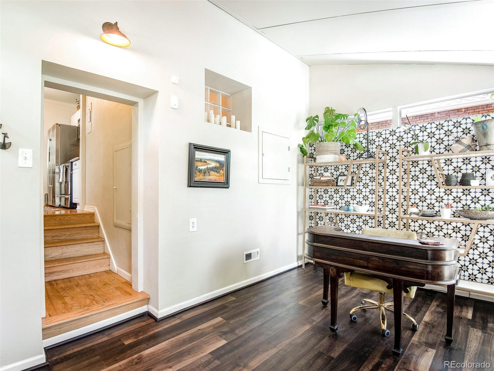 520 East 5th Avenue Denver, CO 80203 - Photo 27 of 40 a view of entryway with workspace and wooden floor