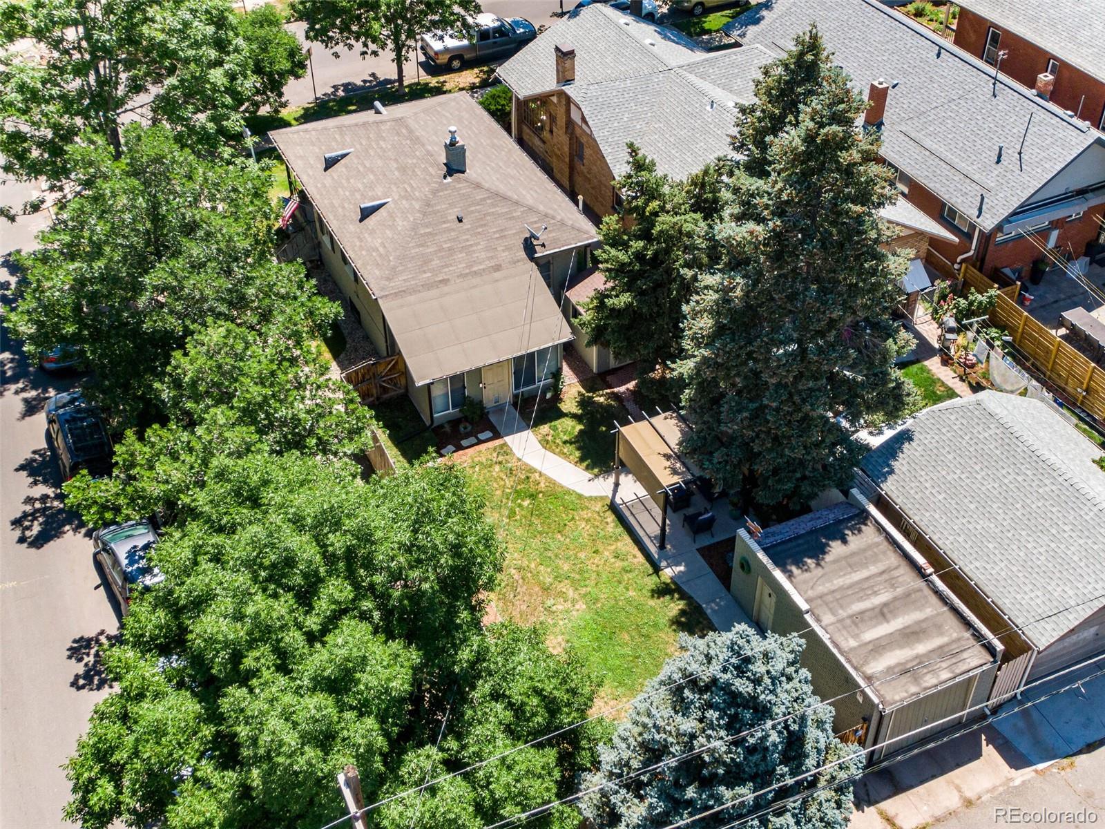 520 East 5th Avenue Denver, CO 80203 - Photo 35 of 40 an aerial view of a house with a yard and garden