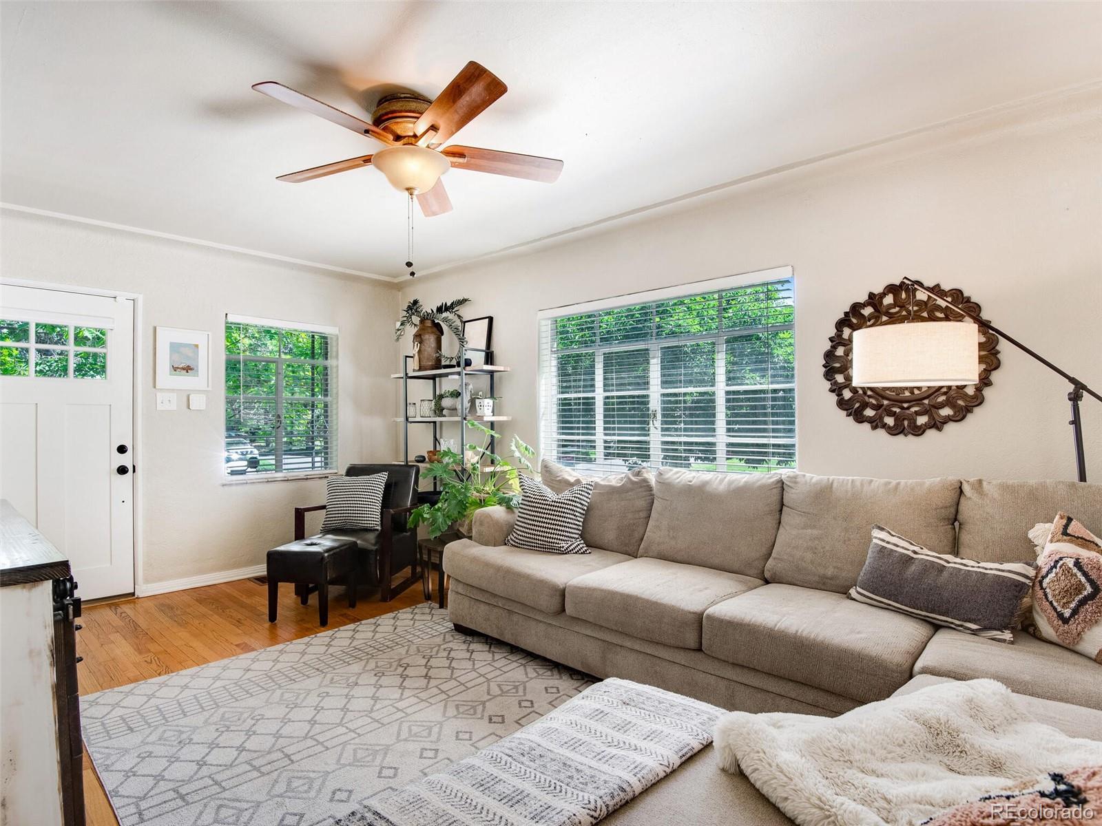 520 East 5th Avenue Denver, CO 80203 - Photo 7 of 40 a living room with furniture and a large window