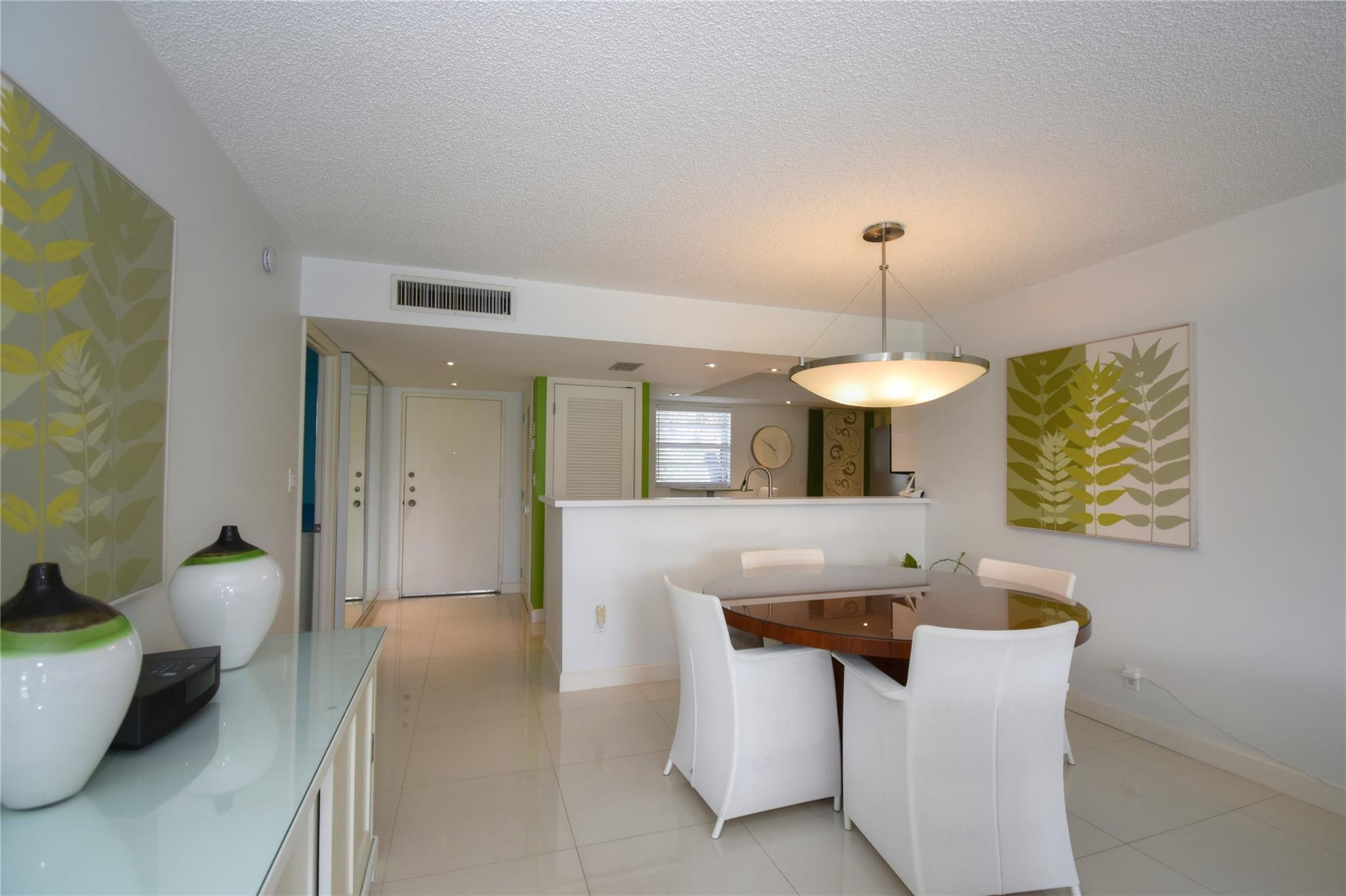 6100 Northwest 2nd Avenue, Unit 323 Boca Raton, FL 33487 - Photo 5 of 28 Kitchen opens to Living room