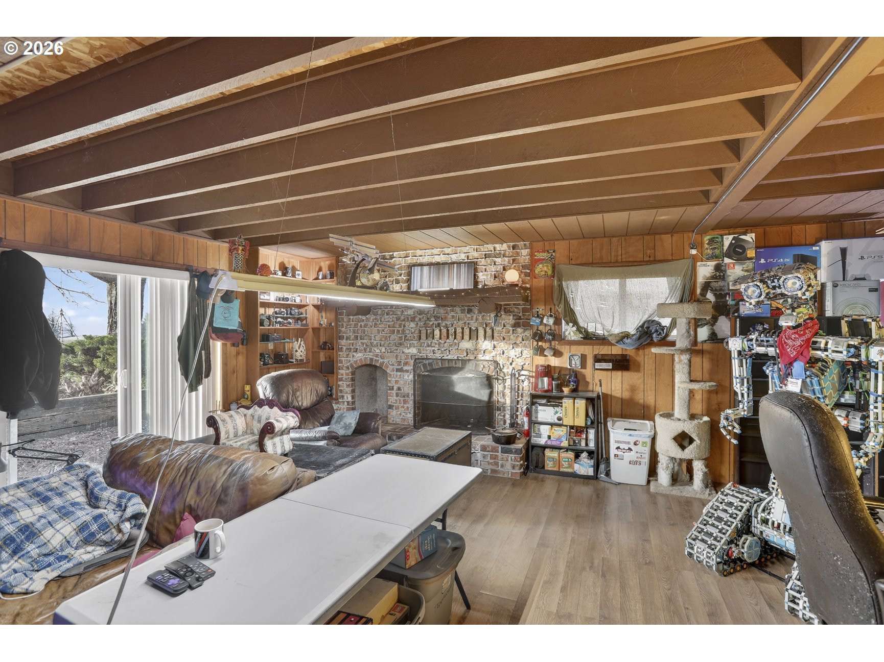 79372 Stewart Creek Road Clatskanie, OR 97016 - Photo 24 of 40 a living room with lots of furniture and a wooden floor