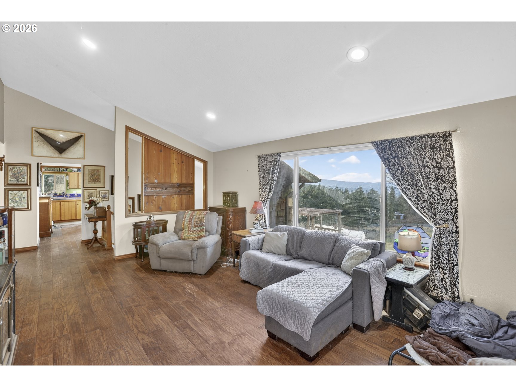 79372 Stewart Creek Road Clatskanie, OR 97016 - Photo 5 of 40 a living room with furniture and a large window