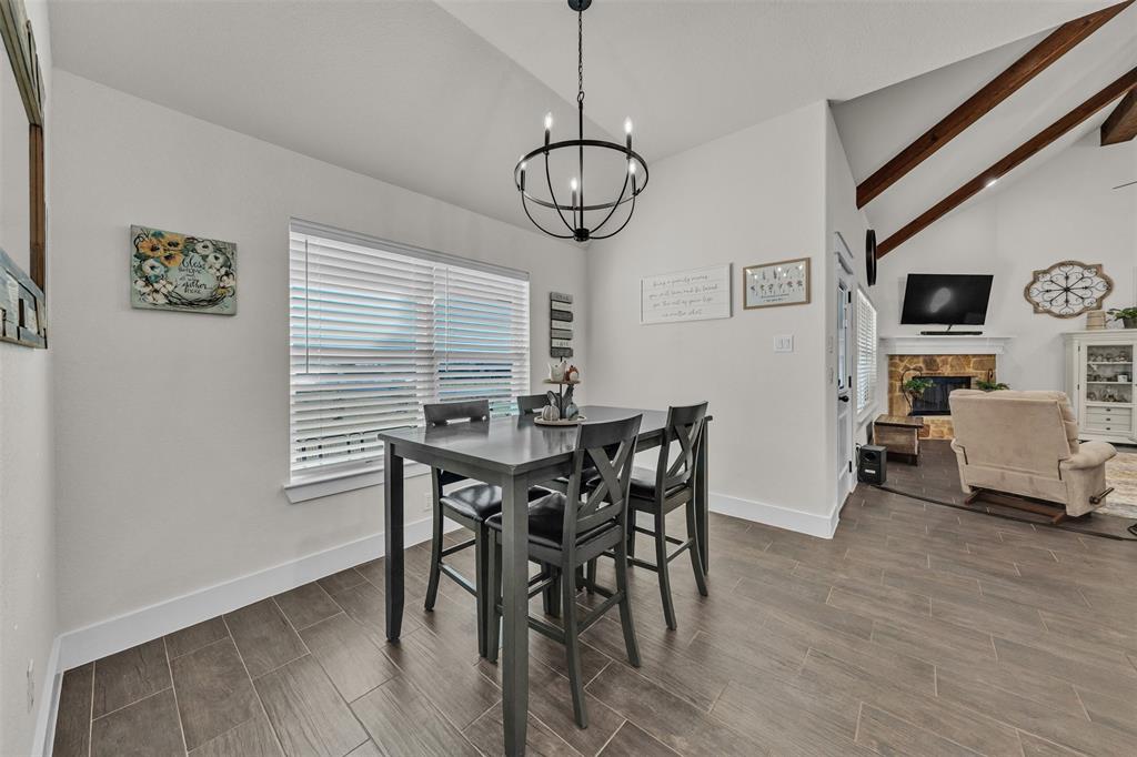 3000 Westfork Way Springtown, TX 76082 - Photo 20 of 35 a view of a dining room with furniture window and wooden floor