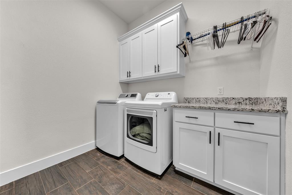 3000 Westfork Way Springtown, TX 76082 - Photo 22 of 35 a utility room with sink dryer and washer