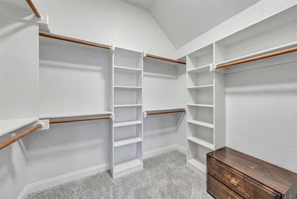 3000 Westfork Way Springtown, TX 76082 - Photo 26 of 35 a view of walk in closet with empty racks