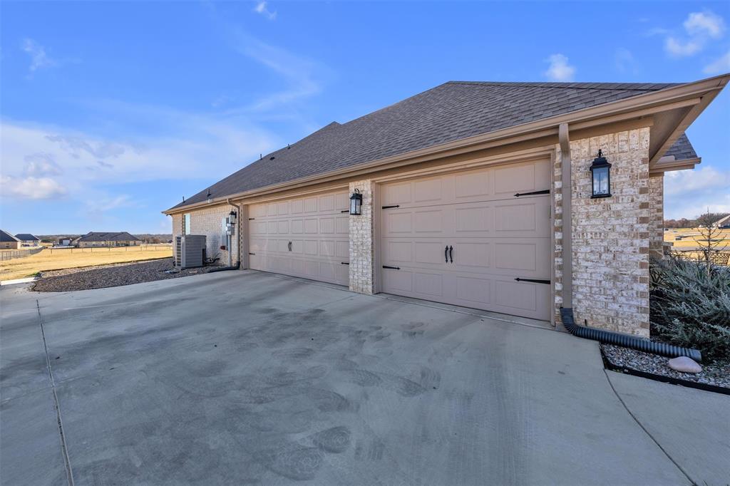 3000 Westfork Way Springtown, TX 76082 - Photo 34 of 35 a view of a house with a yard