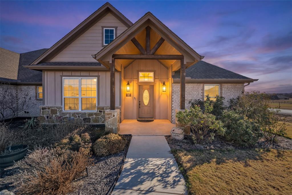 3000 Westfork Way Springtown, TX 76082 - Photo 4 of 35 a front view of a house with garden