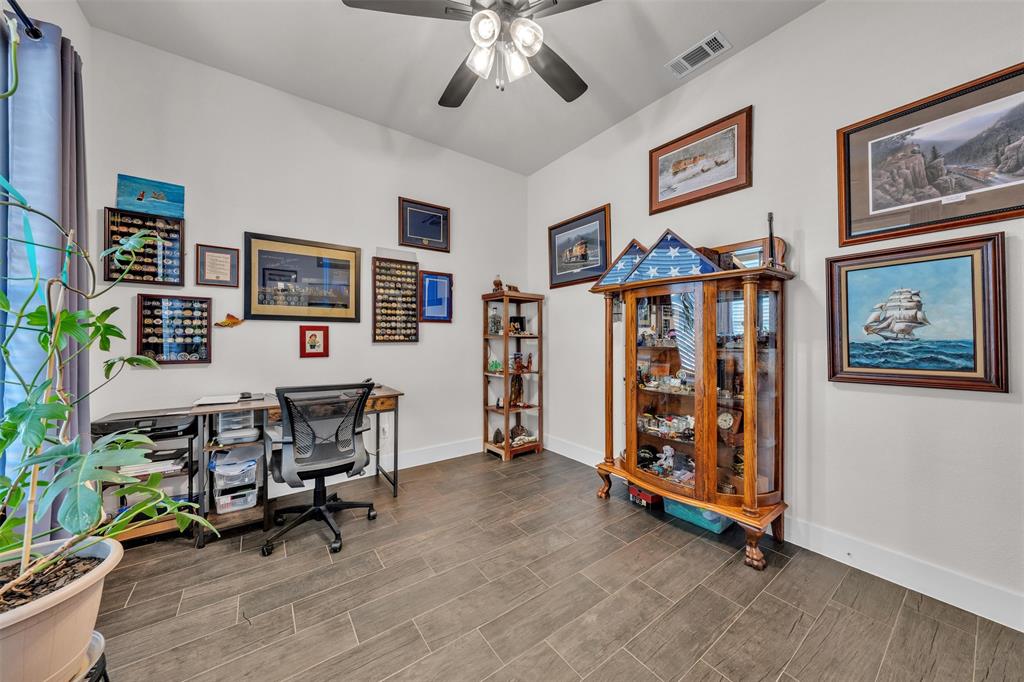 3000 Westfork Way Springtown, TX 76082 - Photo 9 of 35 a workspace with wooden floor and furniture