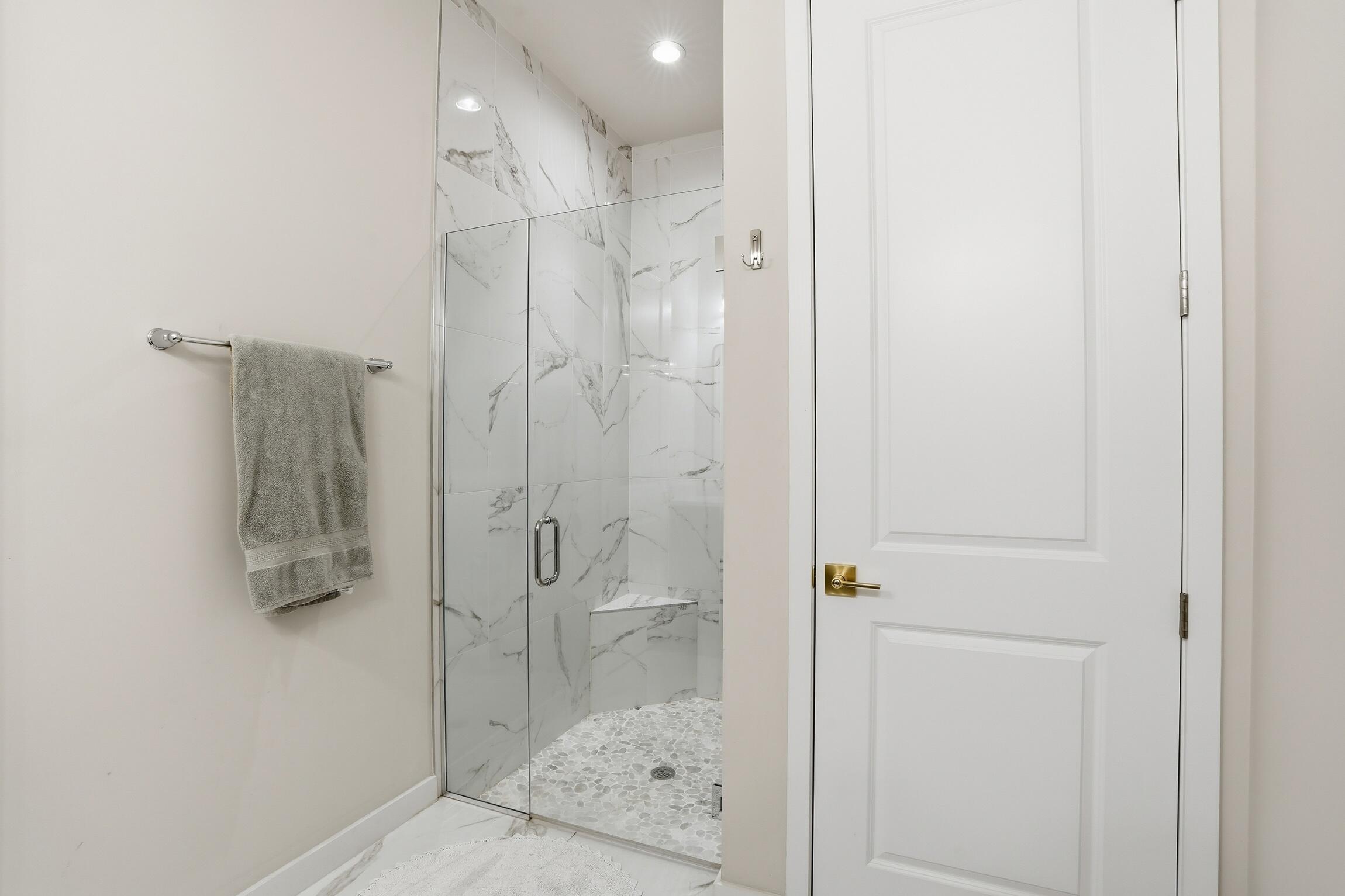 14708 Kingfisher Loop Naples, FL 34120 - Photo 25 of 42 a bathroom with a shower