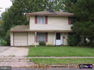 60 Terrace Road Levittown, PA 19056 - Photo 1 of 3 a front view of a house with a yard