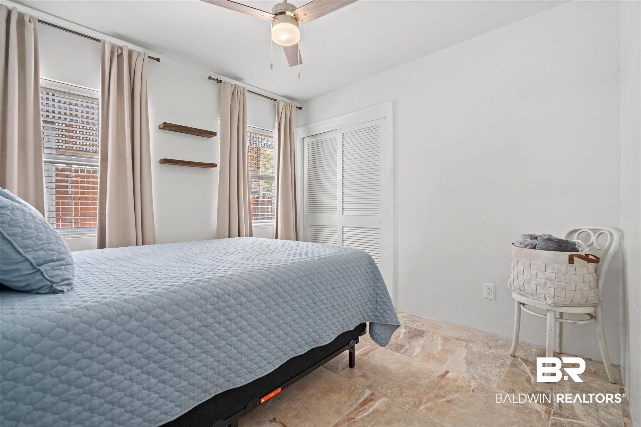 3720 Rabbit Creek Court Theodore, AL 36582 - Photo 16 of 47 Bedroom with stone finish floors, a closet, and a ceiling fan