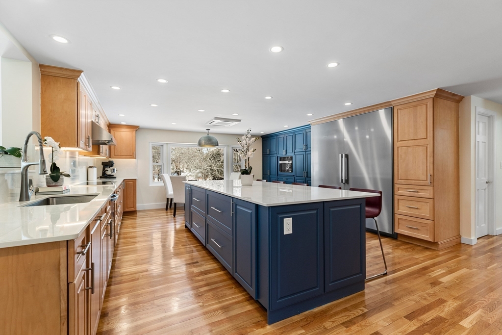 1 Maureen Road Lexington, MA 02420 - Photo 13 of 40 a spacious kitchen with stainless steel appliances granite countertop a large counter top and a sink