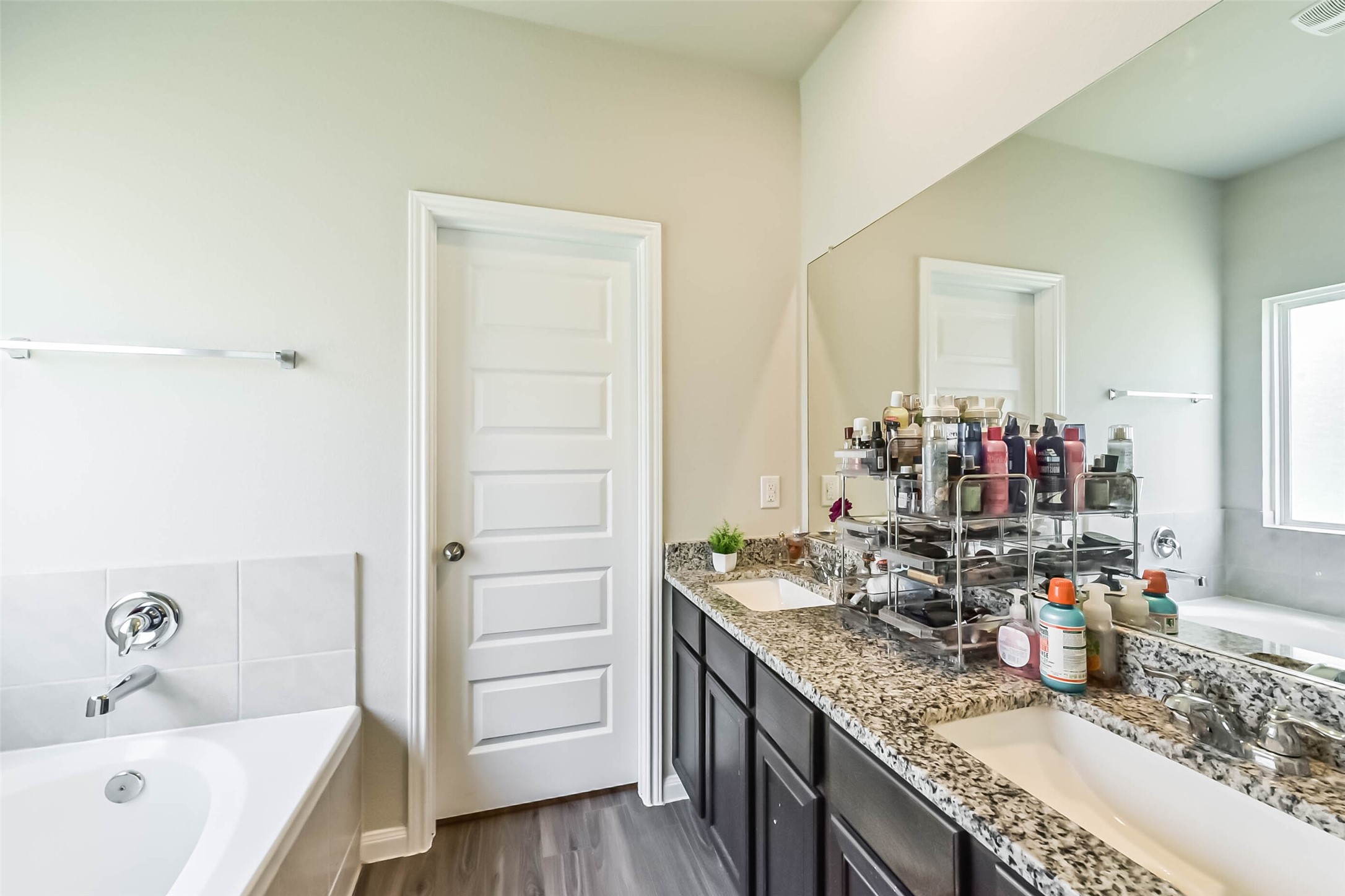 4907 Luke Matthew Drive Rosharon, TX 77583 - Photo 21 of 42 a bathroom with a granite countertop sink and a mirror