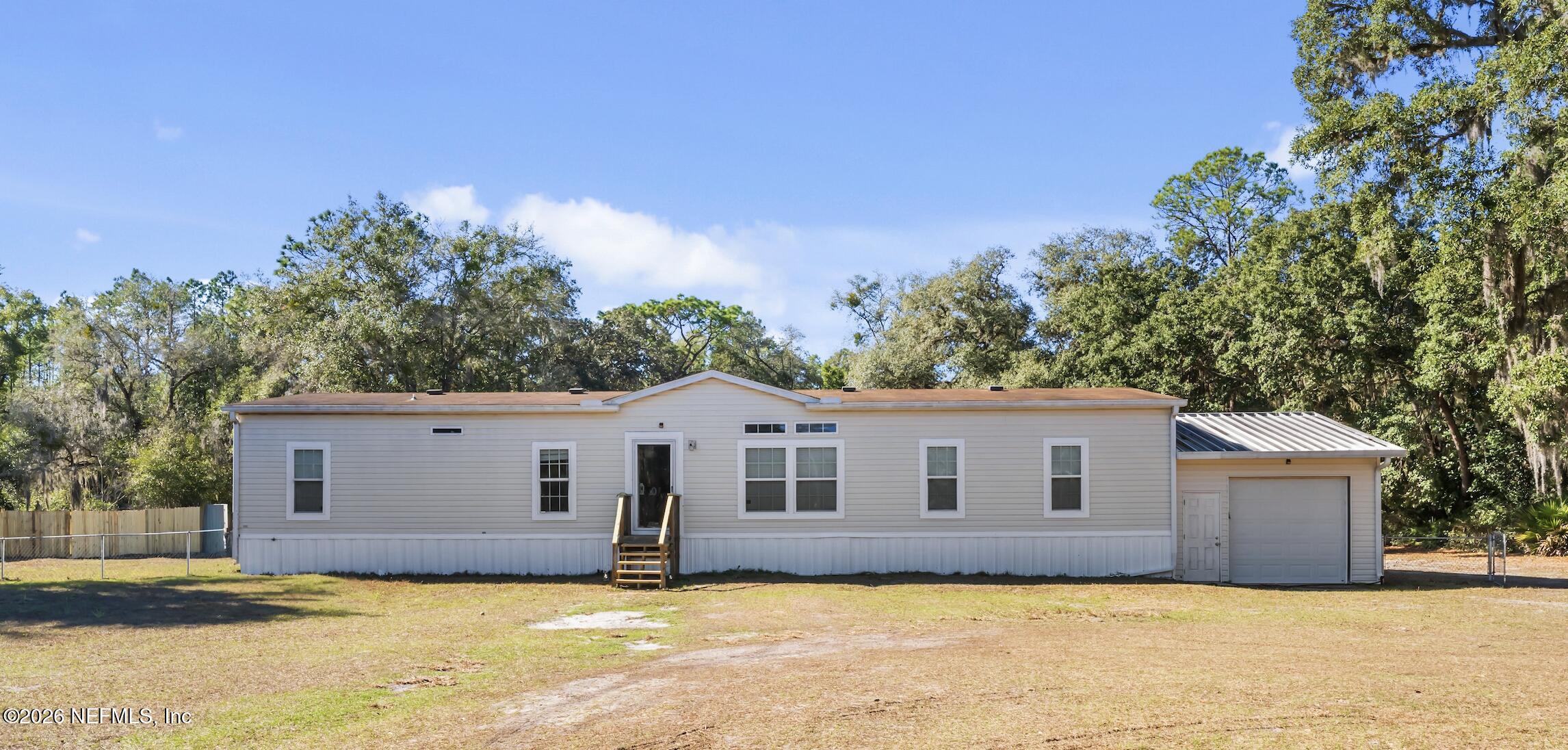 a view of a house with a patio