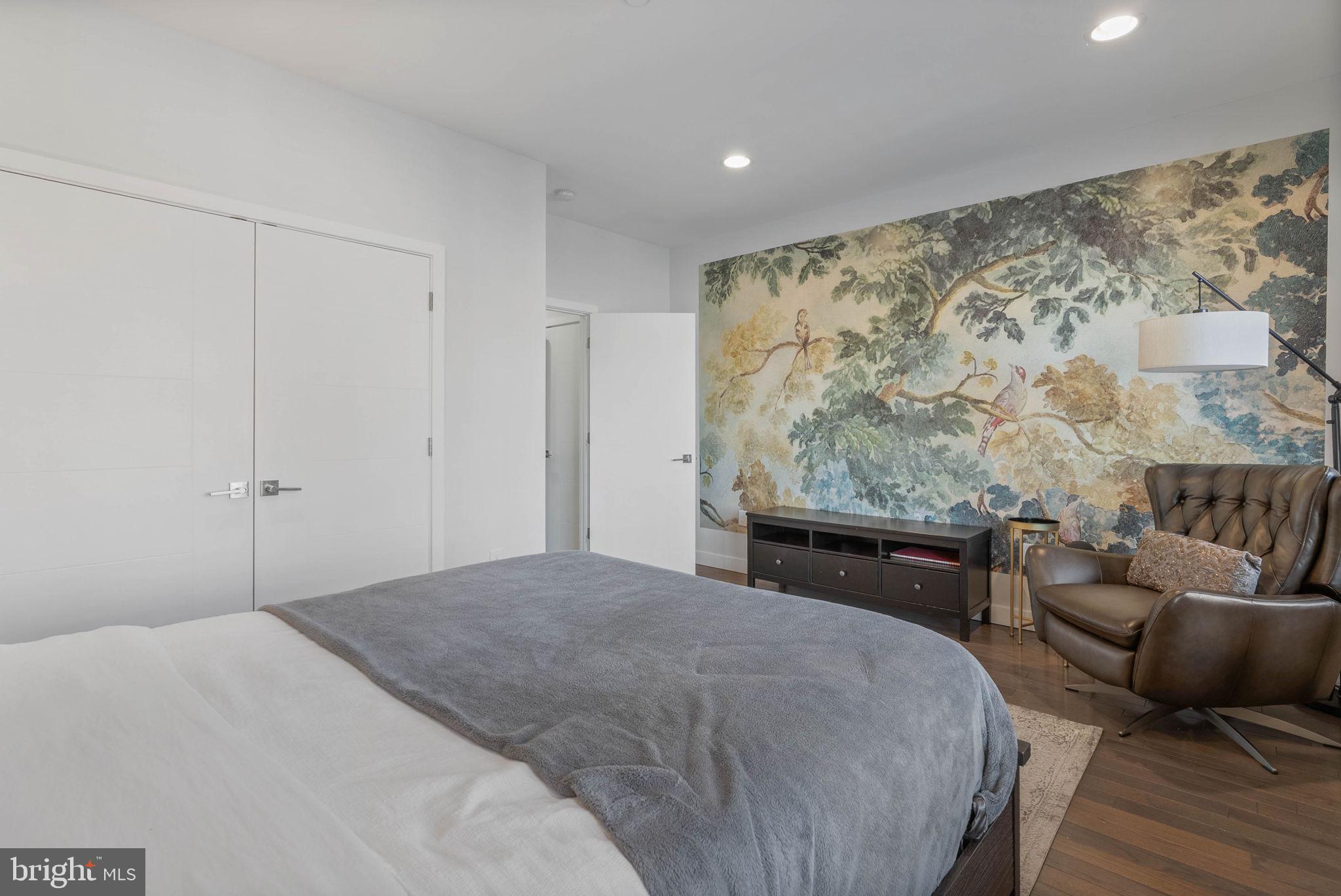 1753 North Marshall Street, Unit B Philadelphia, PA 19122 - Photo 13 of 34 a bedroom with a bed couch and a couch