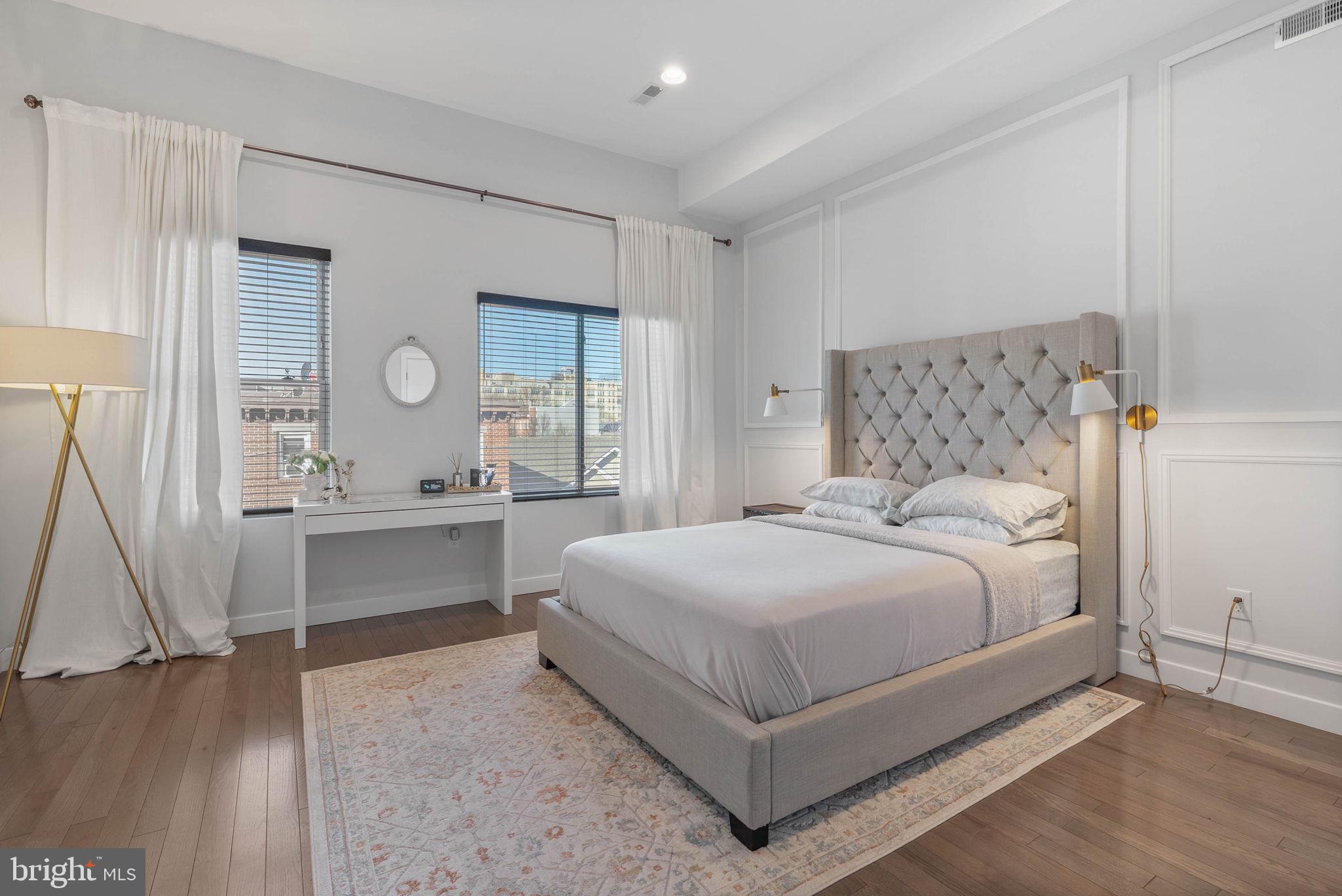 1753 North Marshall Street, Unit B Philadelphia, PA 19122 - Photo 14 of 34 a bedroom with a bed and a table