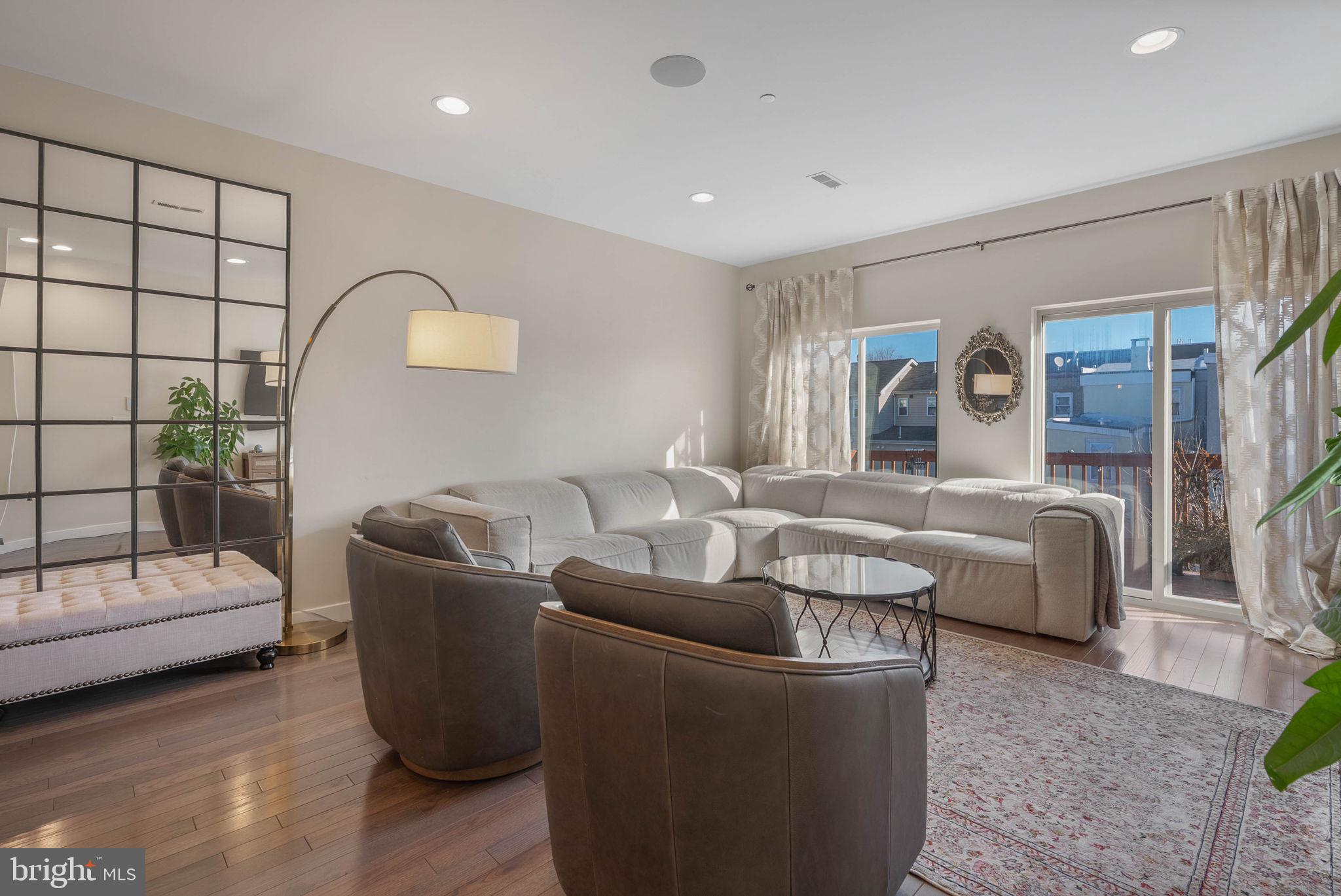 1753 North Marshall Street, Unit B Philadelphia, PA 19122 - Photo 2 of 34 a living room with furniture and a window