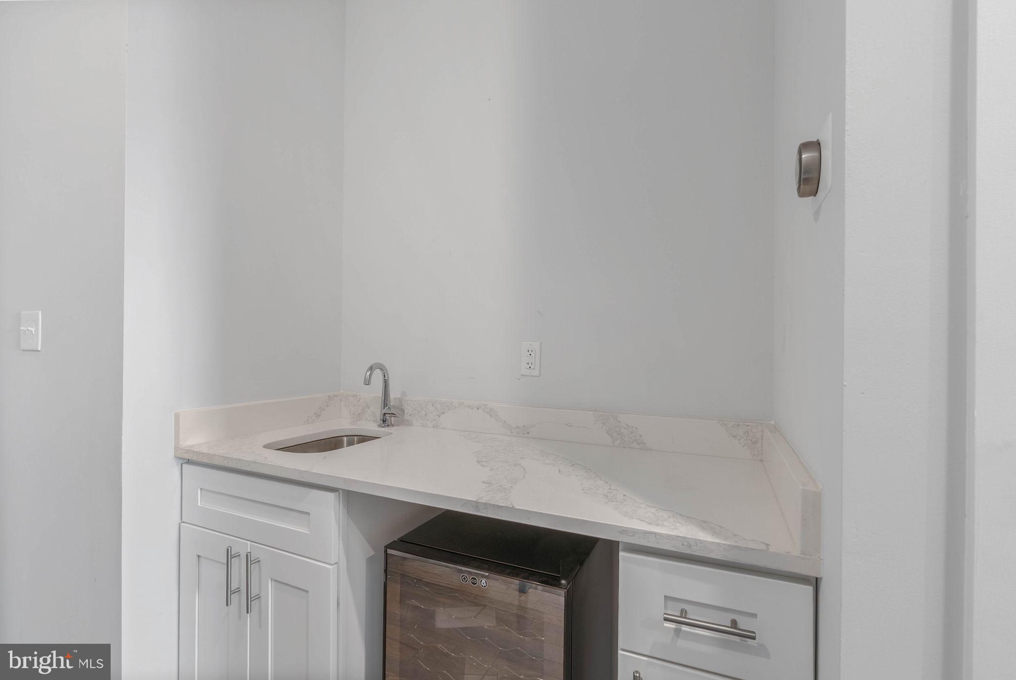 1753 North Marshall Street, Unit B Philadelphia, PA 19122 - Photo 21 of 34 a sink with a vanity