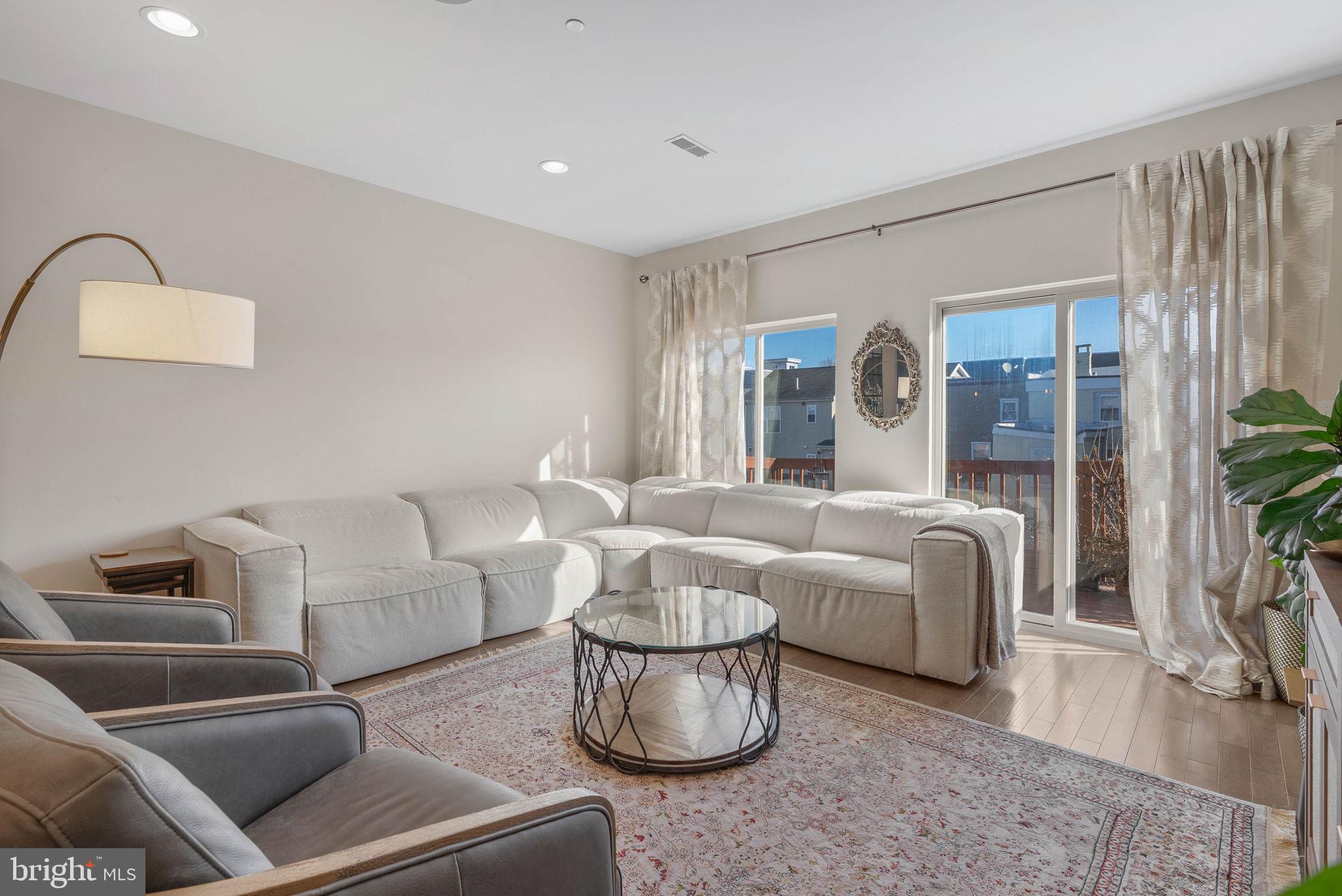 1753 North Marshall Street, Unit B Philadelphia, PA 19122 - Photo 4 of 34 a living room with furniture and a potted plant