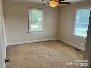 an empty room with window