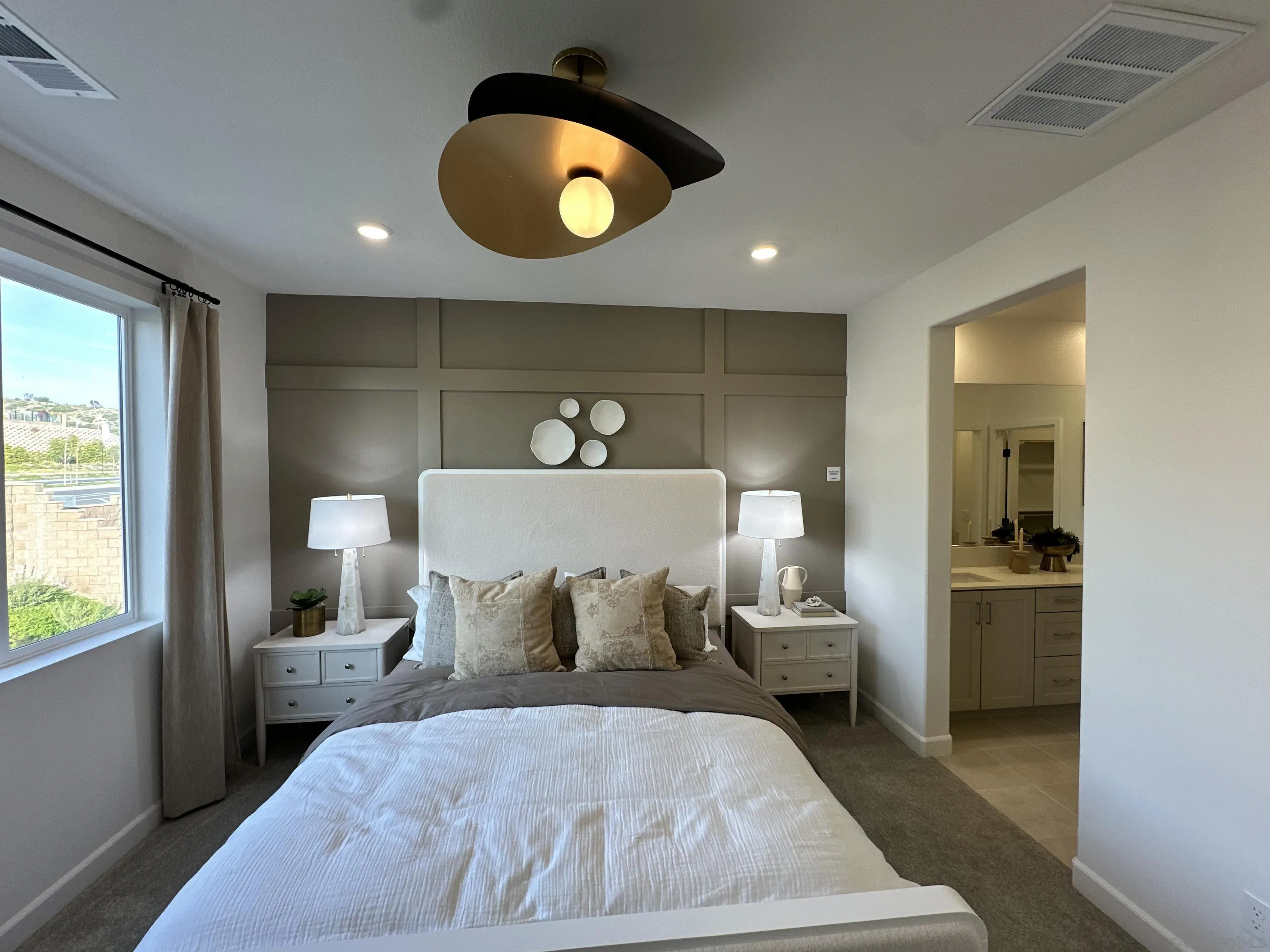 2186 Tributary Drive Chula Vista, CA 91913 - Photo 24 of 30 a bed room with a bed and a window