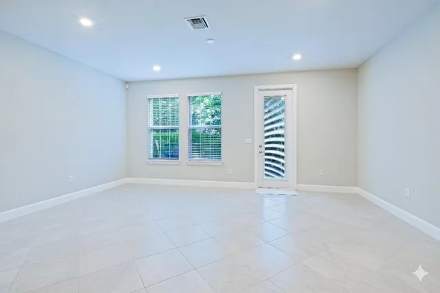 an empty room with windows