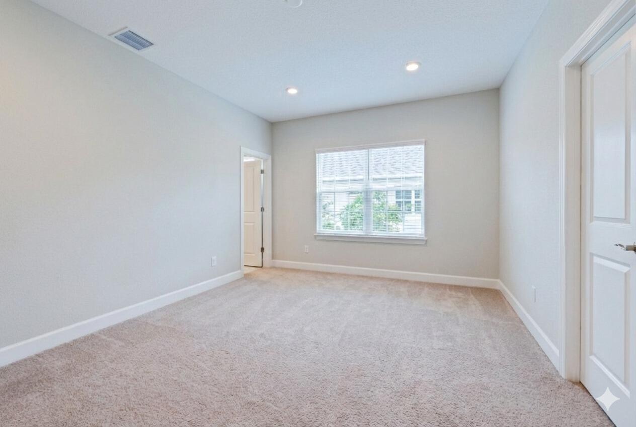 1832 Southeast Roxy Way Stuart, FL 34996 - Photo 18 of 30 an empty room with windows