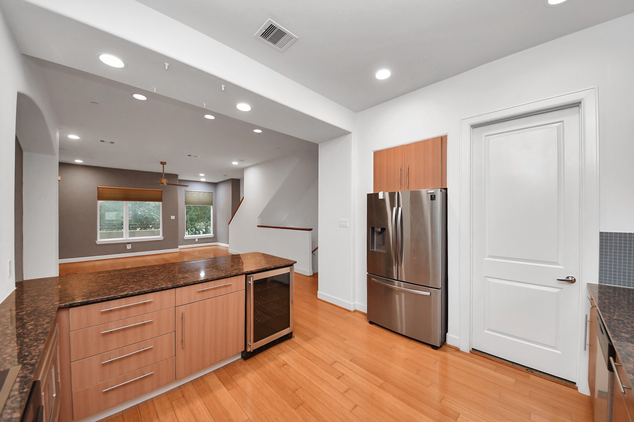 1403 Delano Street, Unit 6 Houston, TX 77003 - Photo 11 of 46 a kitchen with stainless steel appliances granite countertop a refrigerator and a sink