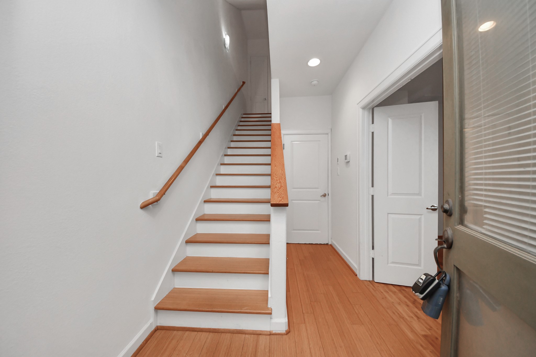 1403 Delano Street, Unit 6 Houston, TX 77003 - Photo 2 of 46 a view of entryway with wooden floor