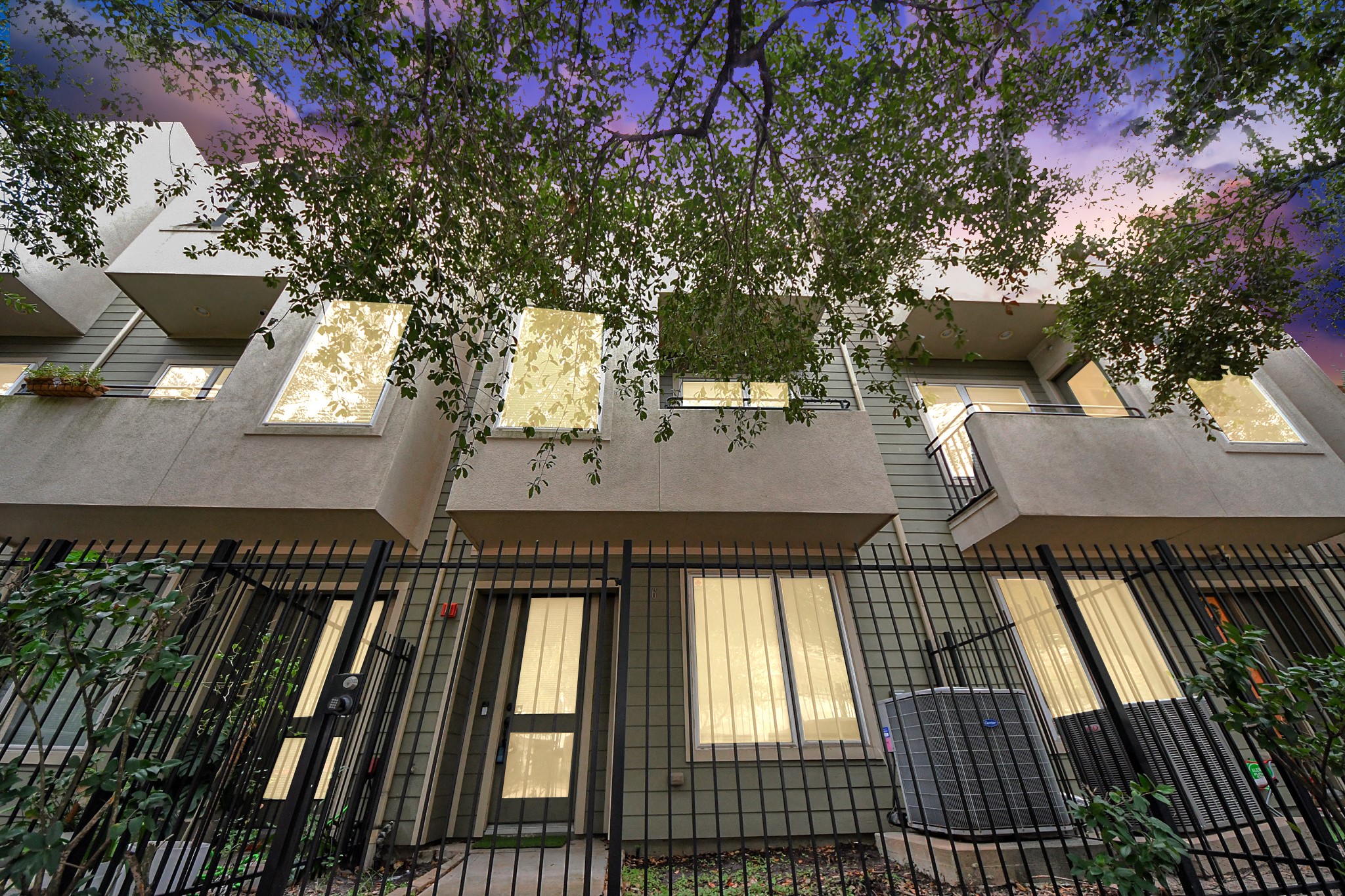 1403 Delano Street, Unit 6 Houston, TX 77003 - Photo 39 of 46 a view of balcony with wooden floor and a potted plant