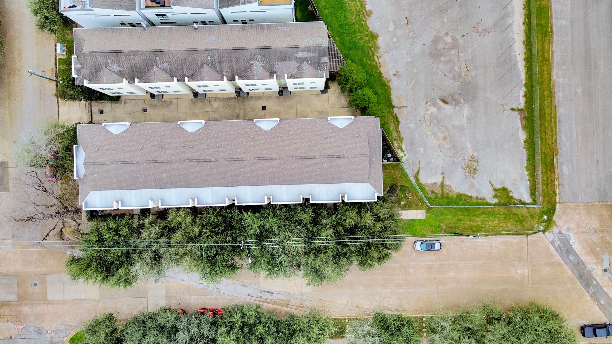 1403 Delano Street, Unit 6 Houston, TX 77003 - Photo 44 of 46 an aerial view of a house with a lake view