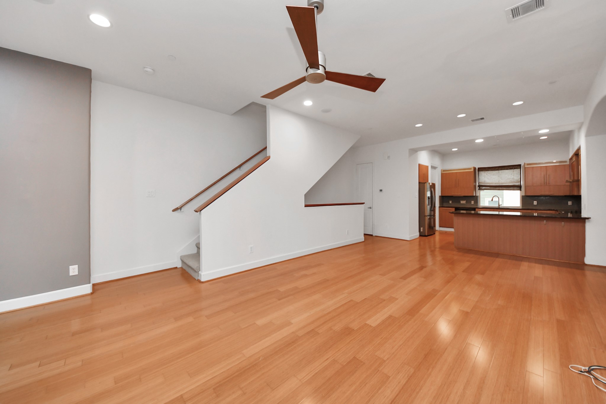 1403 Delano Street, Unit 6 Houston, TX 77003 - Photo 8 of 46 a view of empty room with wooden floor