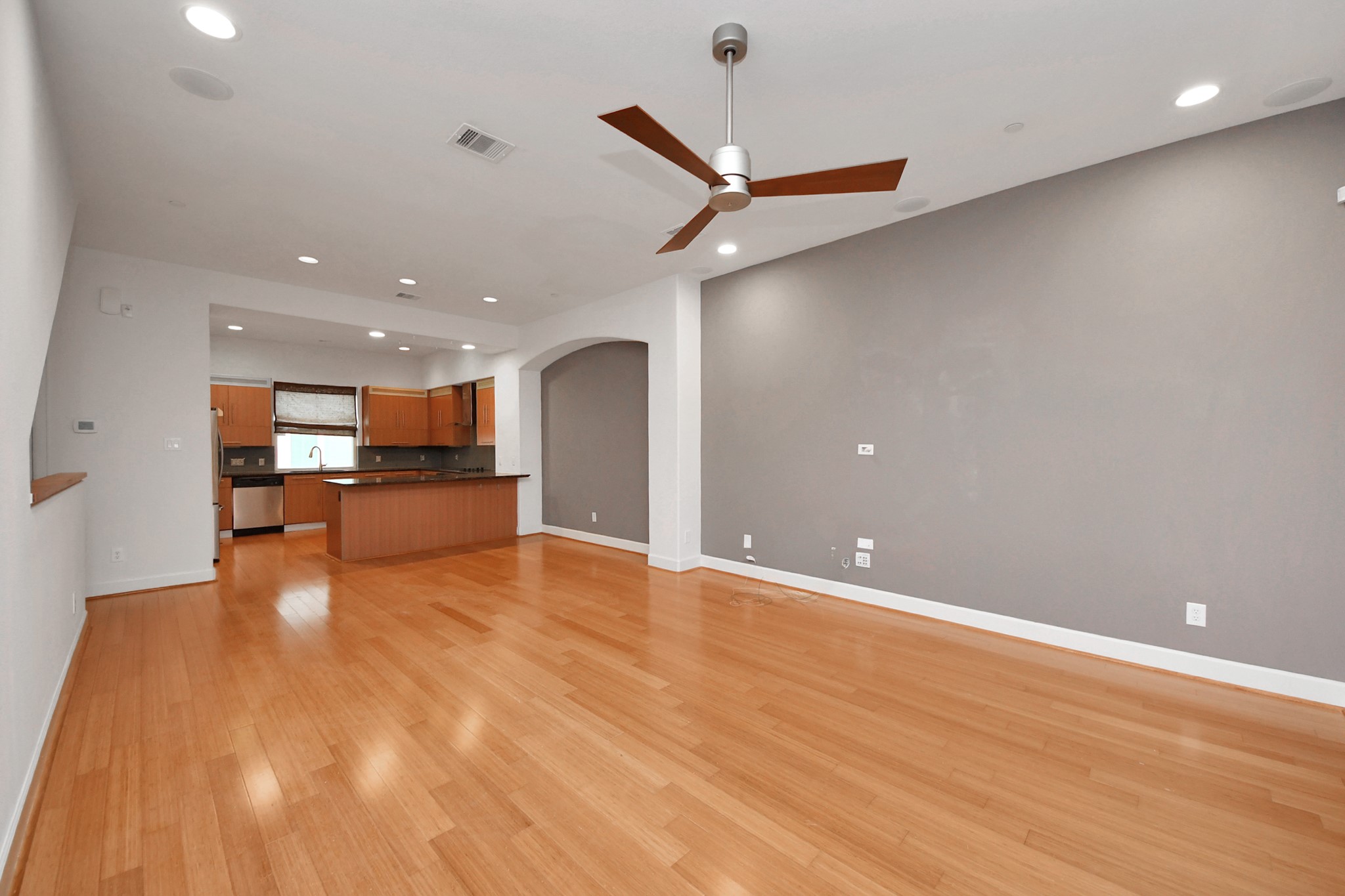 1403 Delano Street, Unit 6 Houston, TX 77003 - Photo 9 of 46 a view of empty room with wooden floor