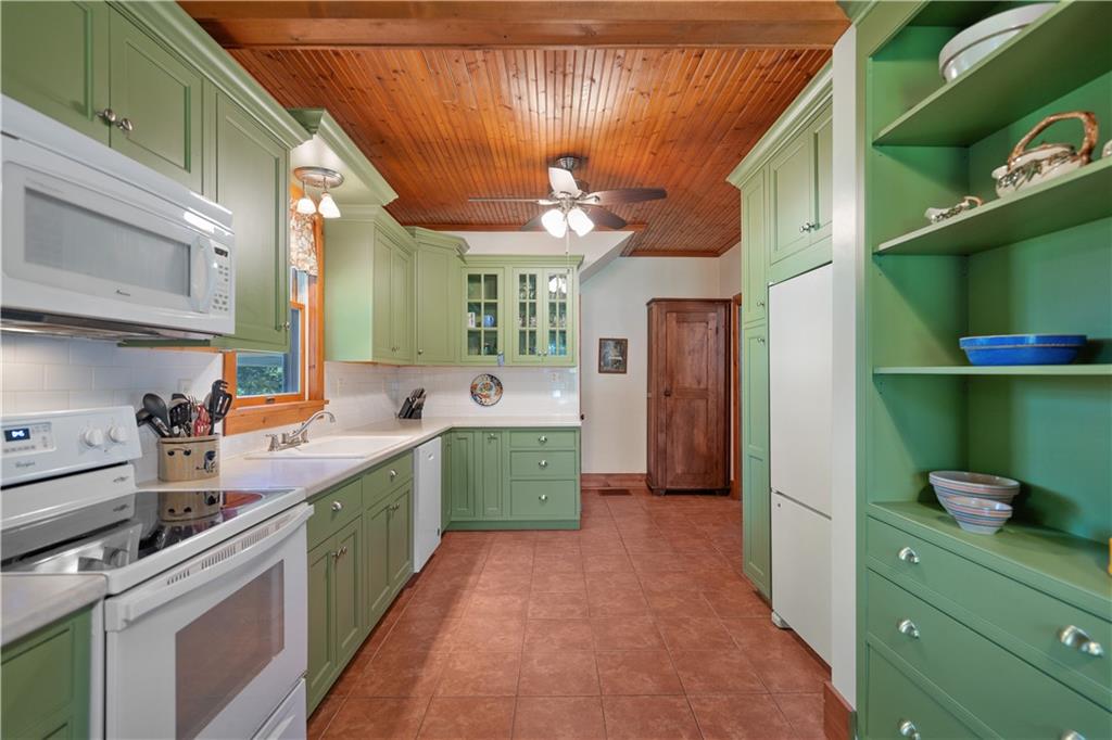 645 Cemetery Road Perryopolis, PA 15473 - Photo 13 of 31 a kitchen with a sink and cabinets